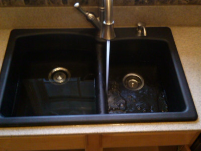 Installing a faucet and a sink