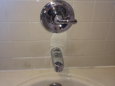 Bathtub faucet replacement and small tile repair