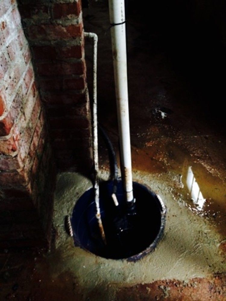 The pit and the discharge pipe from above