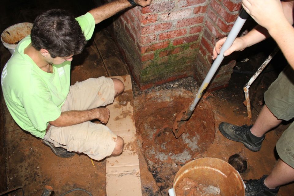 Digging the pit by hand