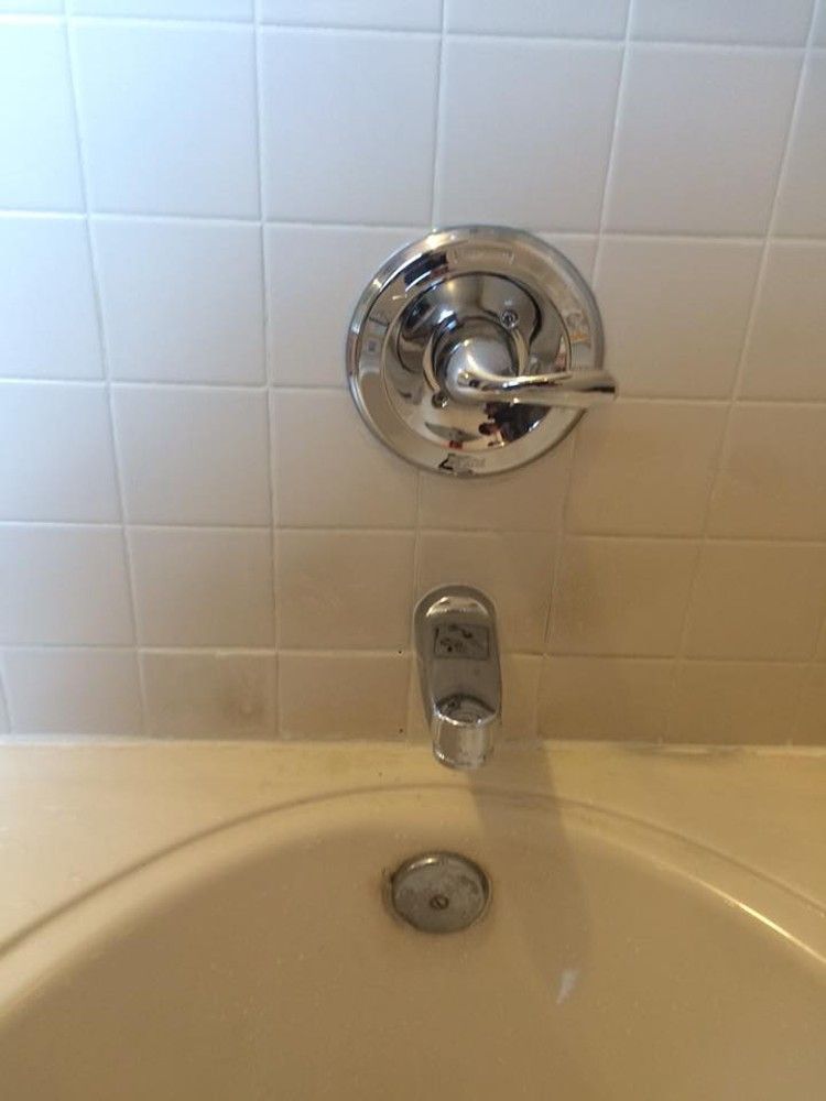Bathtub faucet replacement and small tile repair