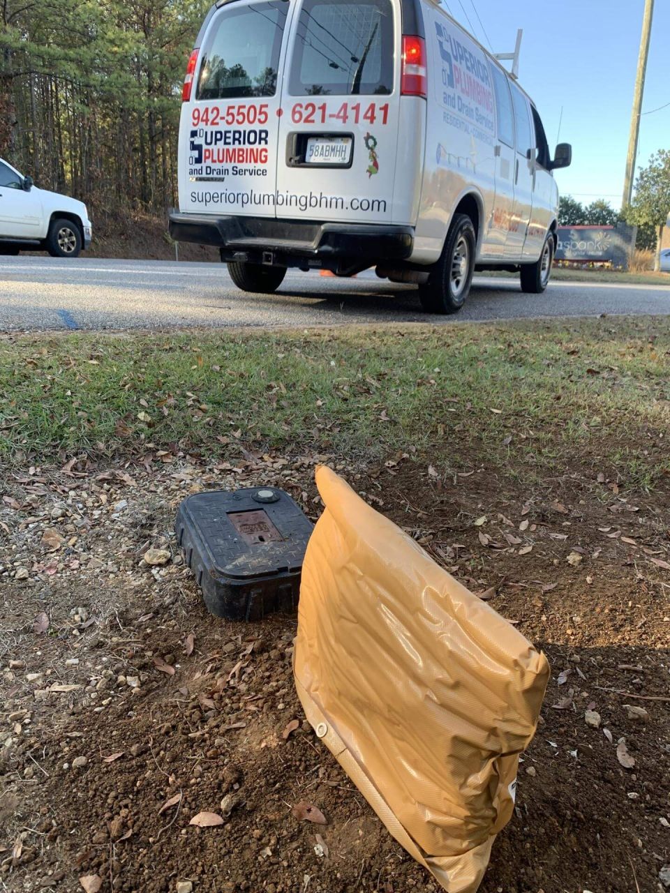 An insulated bag over the RPZ, with our van on the street