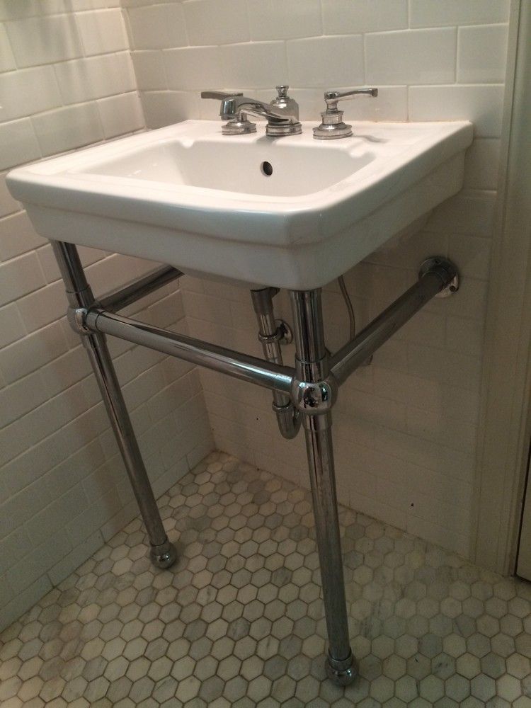 The finished sink on the hexagon tile floor