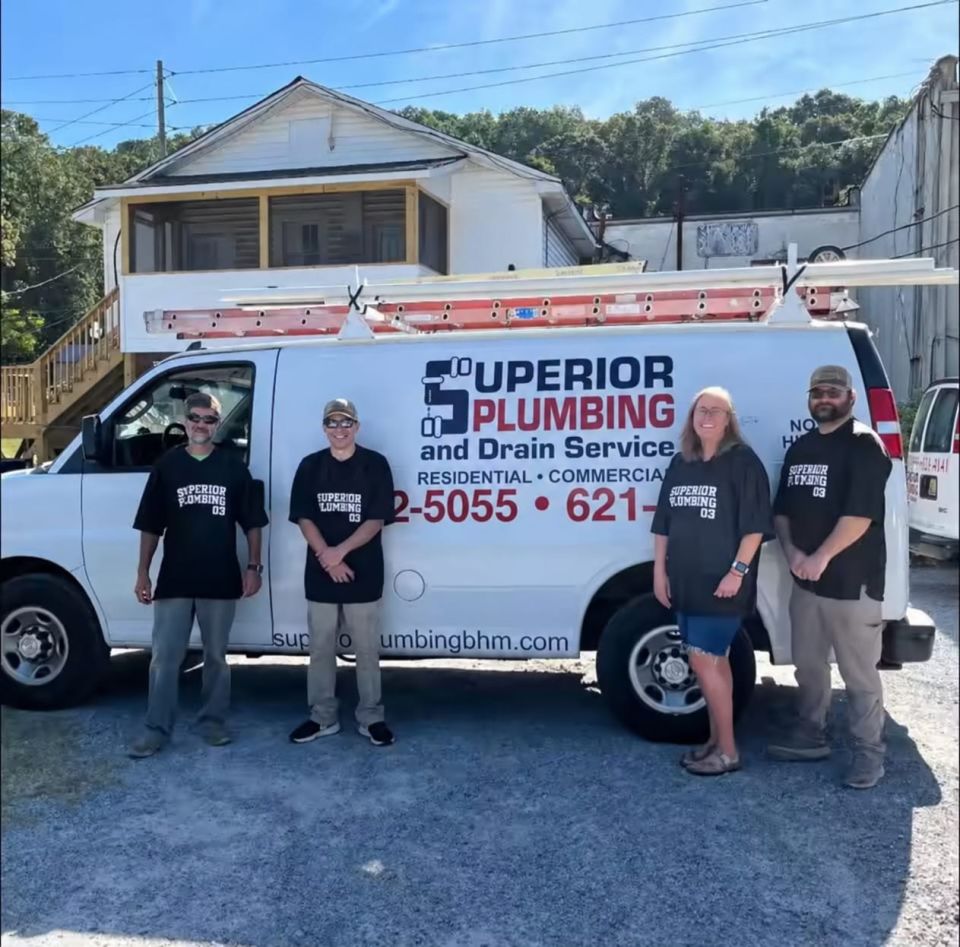The Superior Plumbing & Drain team in front of one of our service vans